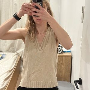 Elegant beige v-neck sweater vest